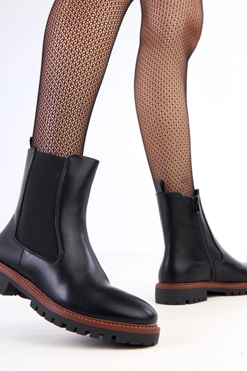 Botines negros con suela plana y costura elástica Terrami