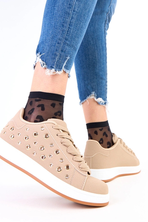 Zapatillas deportivas marrones sobre...