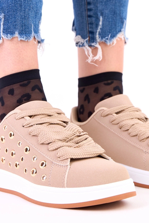 Zapatillas deportivas marrones sobre...