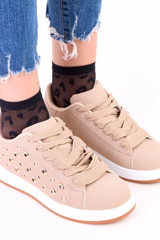 Zapatillas deportivas marrones sobre...