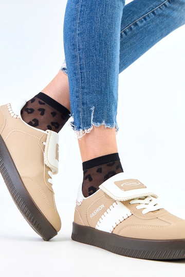Zapatillas deportivas marrones sobre plataforma con costuras Puente 2
