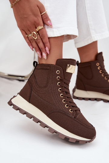 calentamiento zapatos Femenino con una plataforma color marrón Tiene querivira