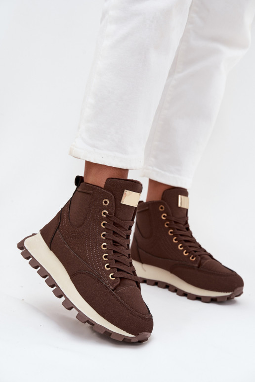 calentamiento zapatos Femenino con una plataforma color marrón Tiene querivira