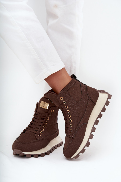 calentamiento zapatos Femenino con una plataforma color marrón Tiene querivira