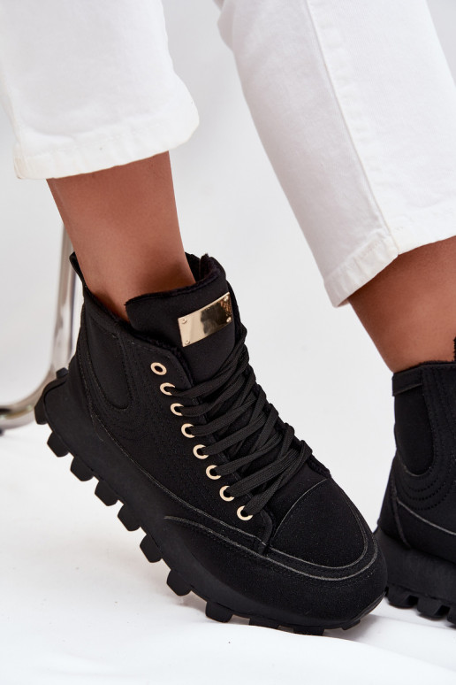 calentamiento zapatos Femenino con una plataforma de color negro Tiene querivira