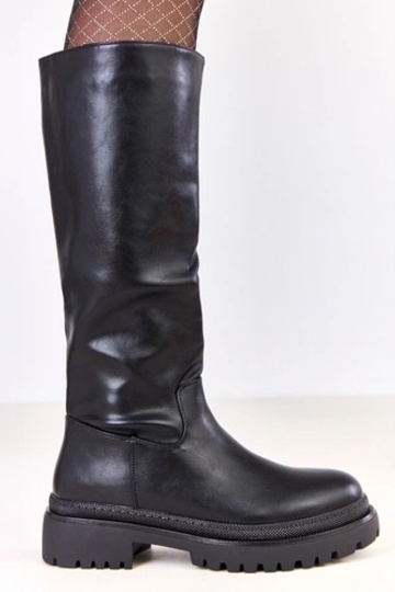 Botas largas negras de piel... 2