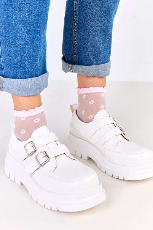 Botines blancos sobre suela masiva,...