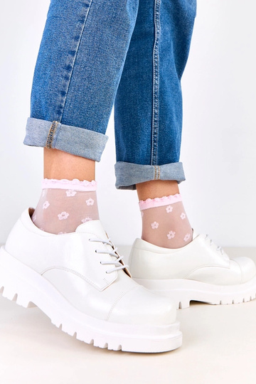 Botines blancos sobre suela... 2