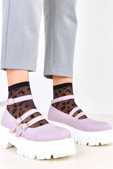 Zapatos morados con suela... 2