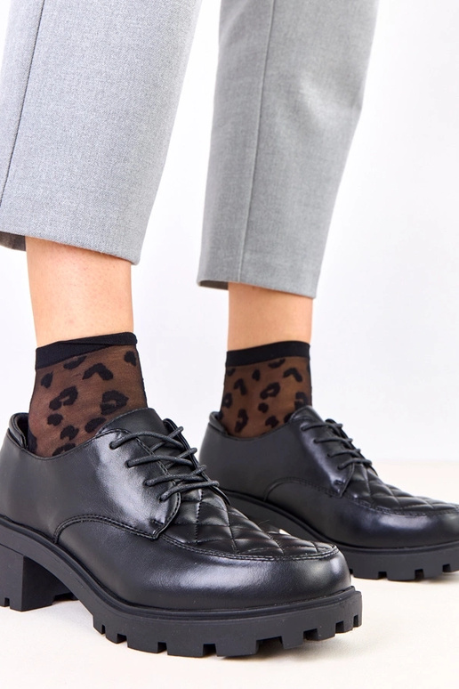 Zapatos negros con costura Kensey