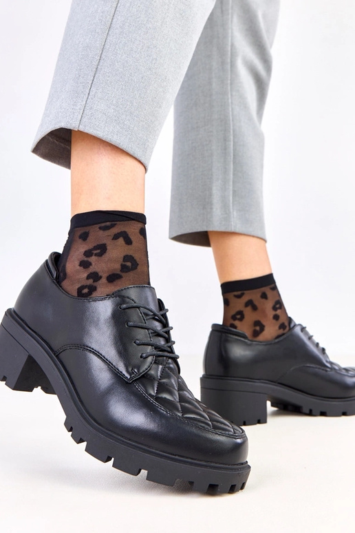 Zapatos negros con costura Kensey