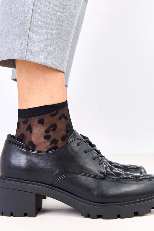 Zapatos negros con costura Kensey