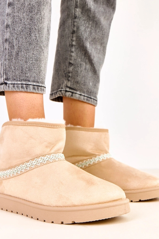 Botas bajas de nieve color arena de... Botas bajas de nieve color arena de...