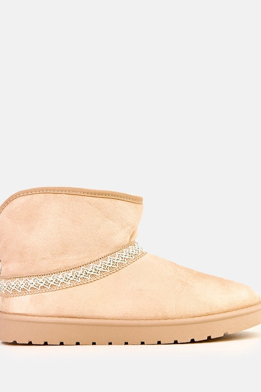 Botas bajas de nieve color arena de... Botas bajas de nieve color arena de...