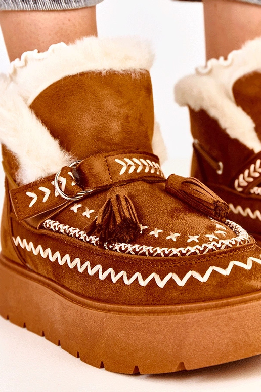 Botas de nieve marrones con... Botas de nieve marrones con...