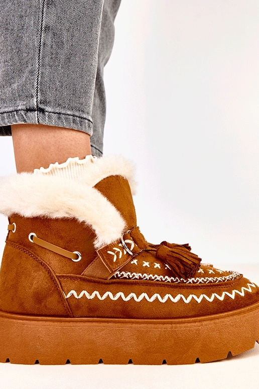 Botas de nieve marrones con... Botas de nieve marrones con...