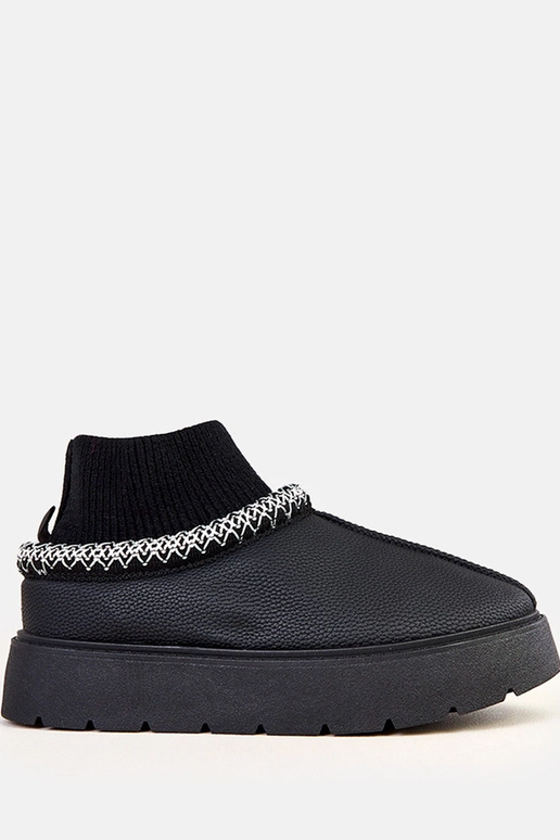 Botas de nieve negros con caña en... Botas de nieve negros con caña en...