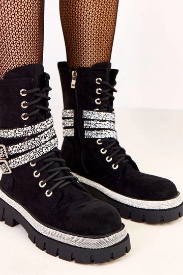 Botas elegantes negras de...