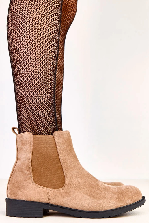 Botines planos marrones con elástico...