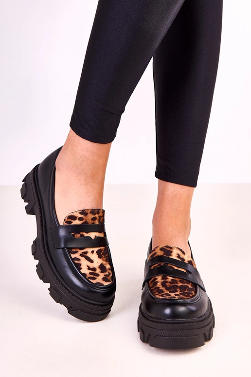 Mocasines negros con acento de...