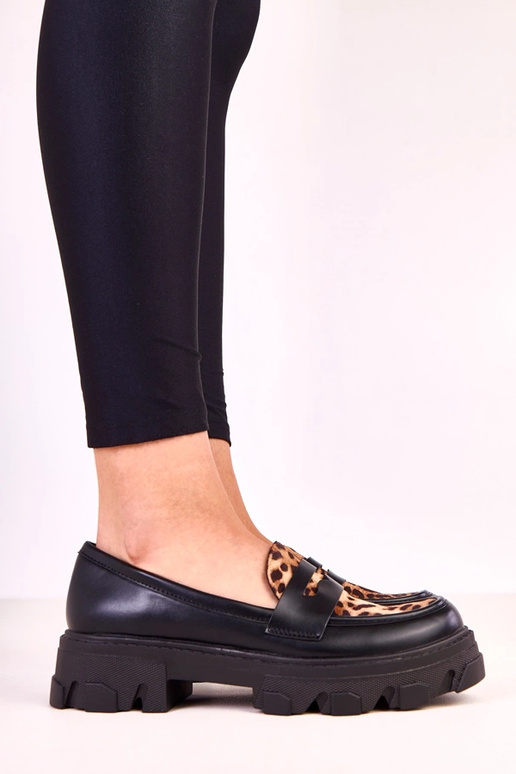 Mocasines negros con acento de...