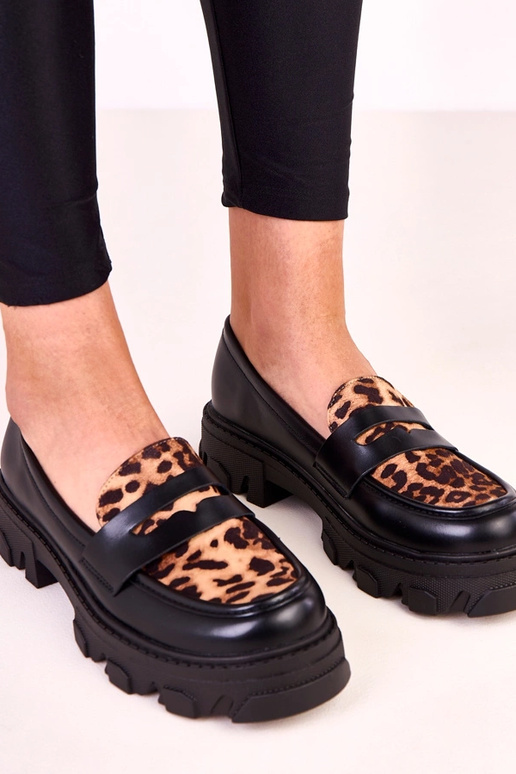 Mocasines negros con acento de...