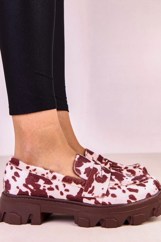 Mocasines marrones con manchas de...