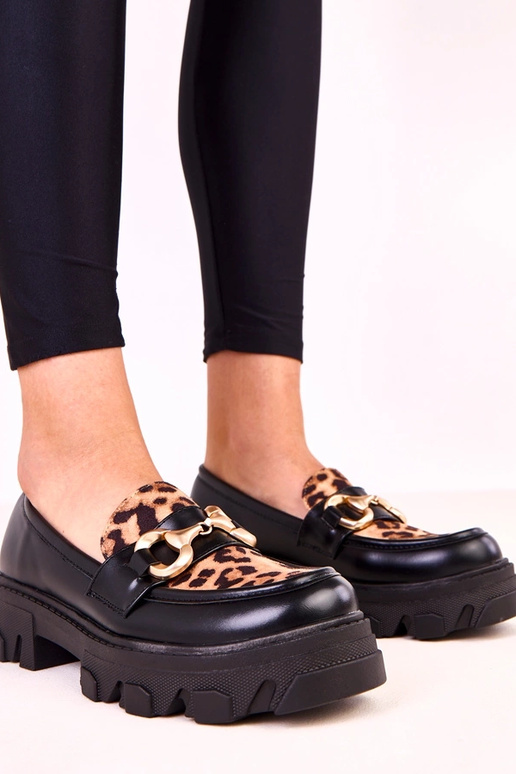 Mocasines negros con acento de...