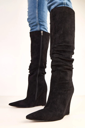 Botas altas negras con...