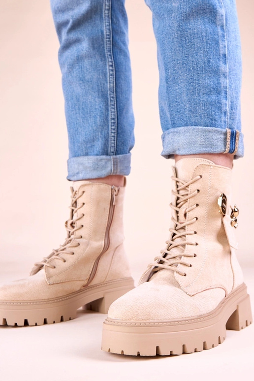 Botines de mujer color arena con un...