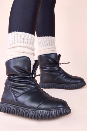 Botas negras de nieve de cuero natural con goma Raschmi 2