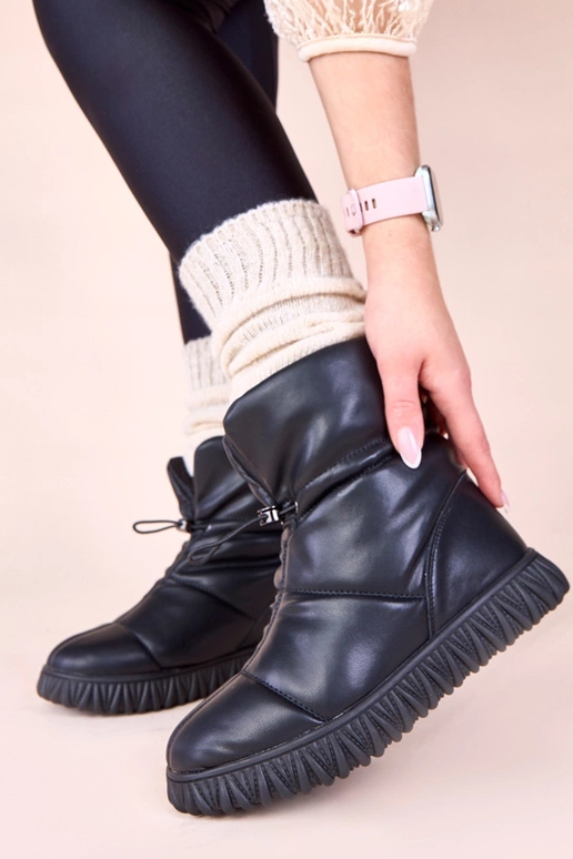 Botas negras de nieve de cuero...