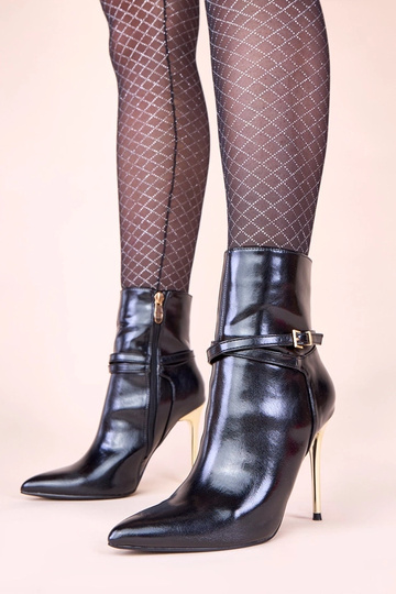 Botines negros con tacón...