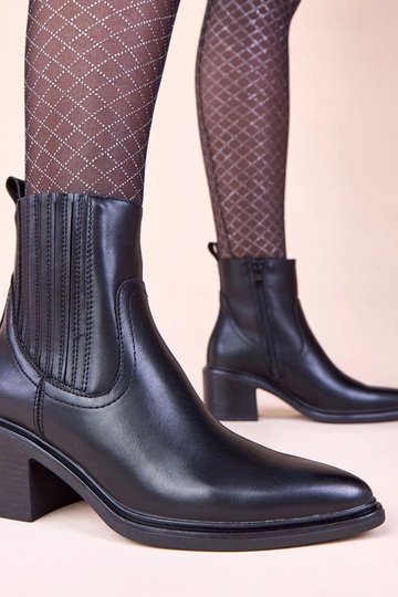 Botines negros sobre tacón con costura elástica Sesie