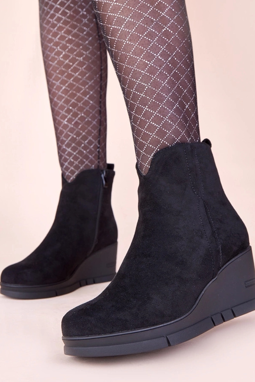 Botines negros con plataforma de ante...