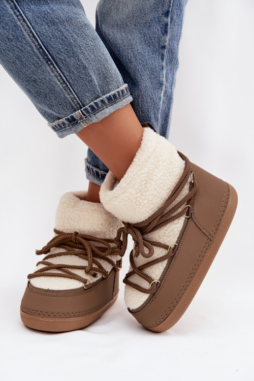 Botas de nieve Femenino con un abrigo de piel Typu Baranek con correas beige Belira