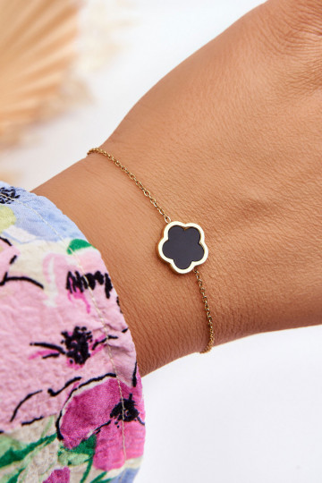Pulsera de mujer con flor negra en color dorado