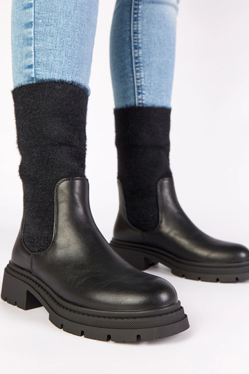 Botines negros con elástico y caña decorada Evelyn