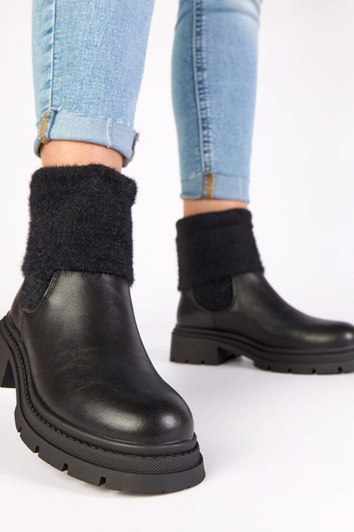 Botines negros con elástico y caña...