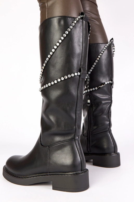 Botas largos negros con decoración de...