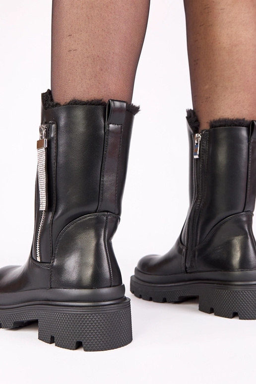 Botines negros sobre plataforma con...