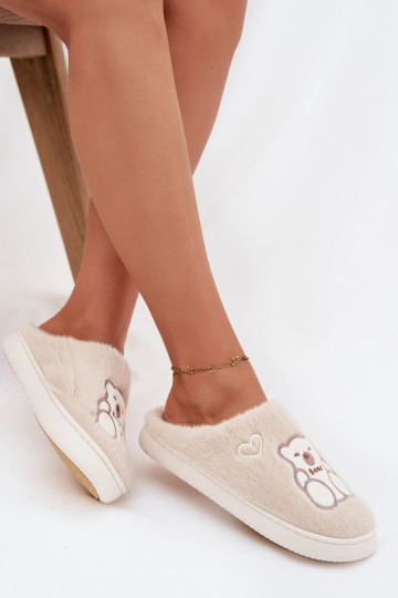 con un abrigo de piel Zapatillas con oso beige Noralie