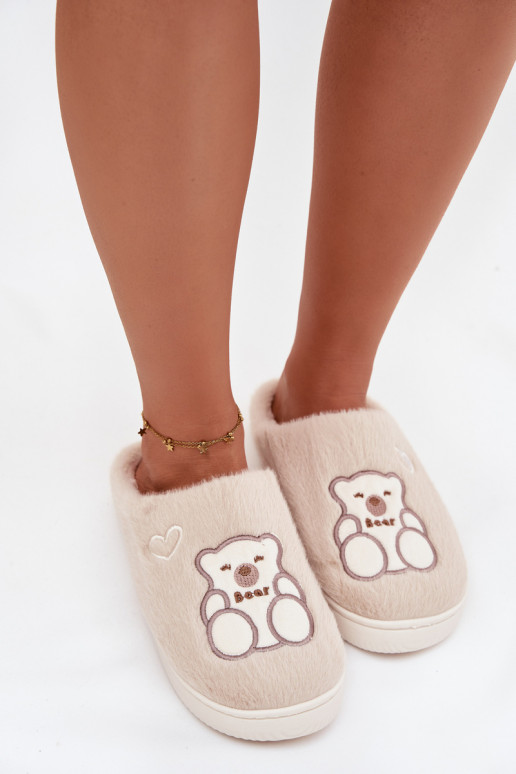 con un abrigo de piel Zapatillas con oso beige Noralie