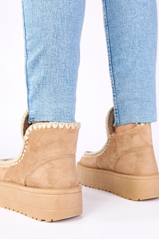 Botas de nieve de color beige oscuro...