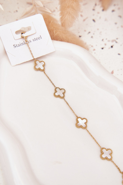 Una pulsera Con colgantes Stal NierdzeAna oro-PerłoAa