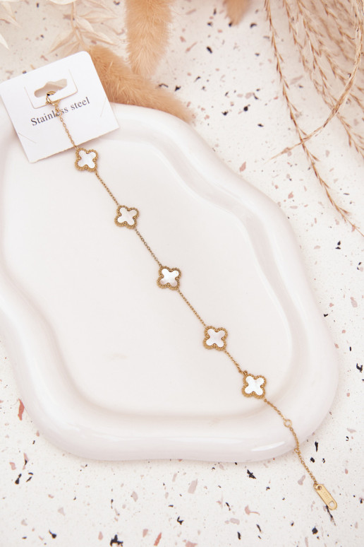 Una pulsera Con colgantes Stal NierdzeAna oro-PerłoAa