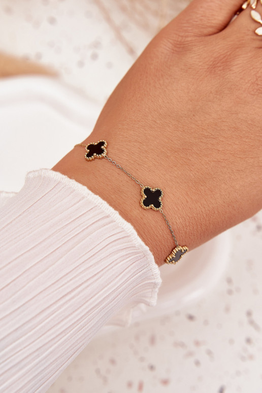 Una pulsera Con colgantes Stal NierdzeAna oro-negro