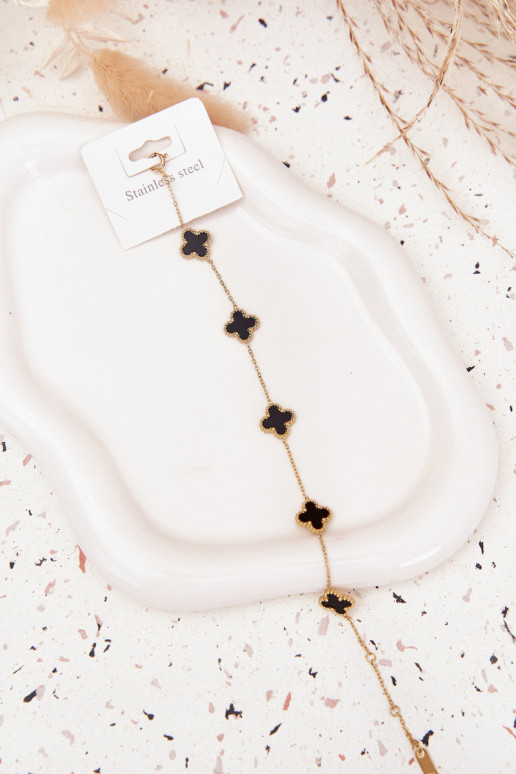 Una pulsera Con colgantes Stal NierdzeAna oro-negro
