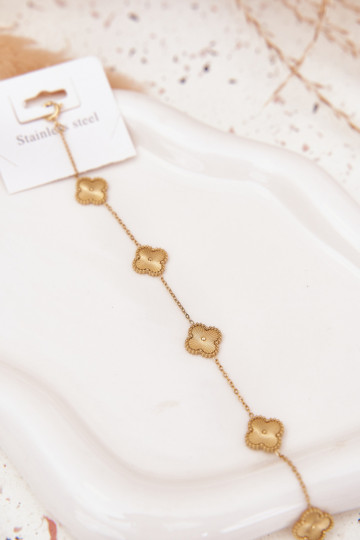 Una pulsera de acero inoxidablecon motivos floralesuszkami color dorado 2