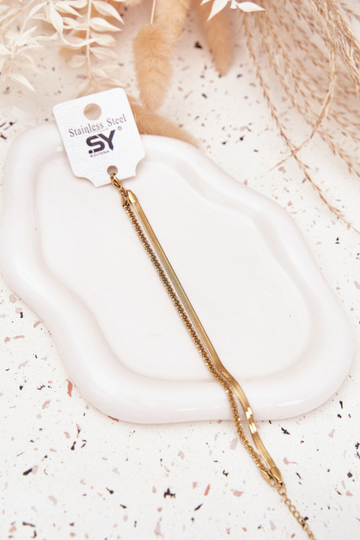 Una pulsera Doble de acero inoxidable color dorado